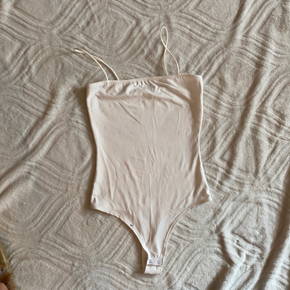 white small black mark but can’t see when worn
